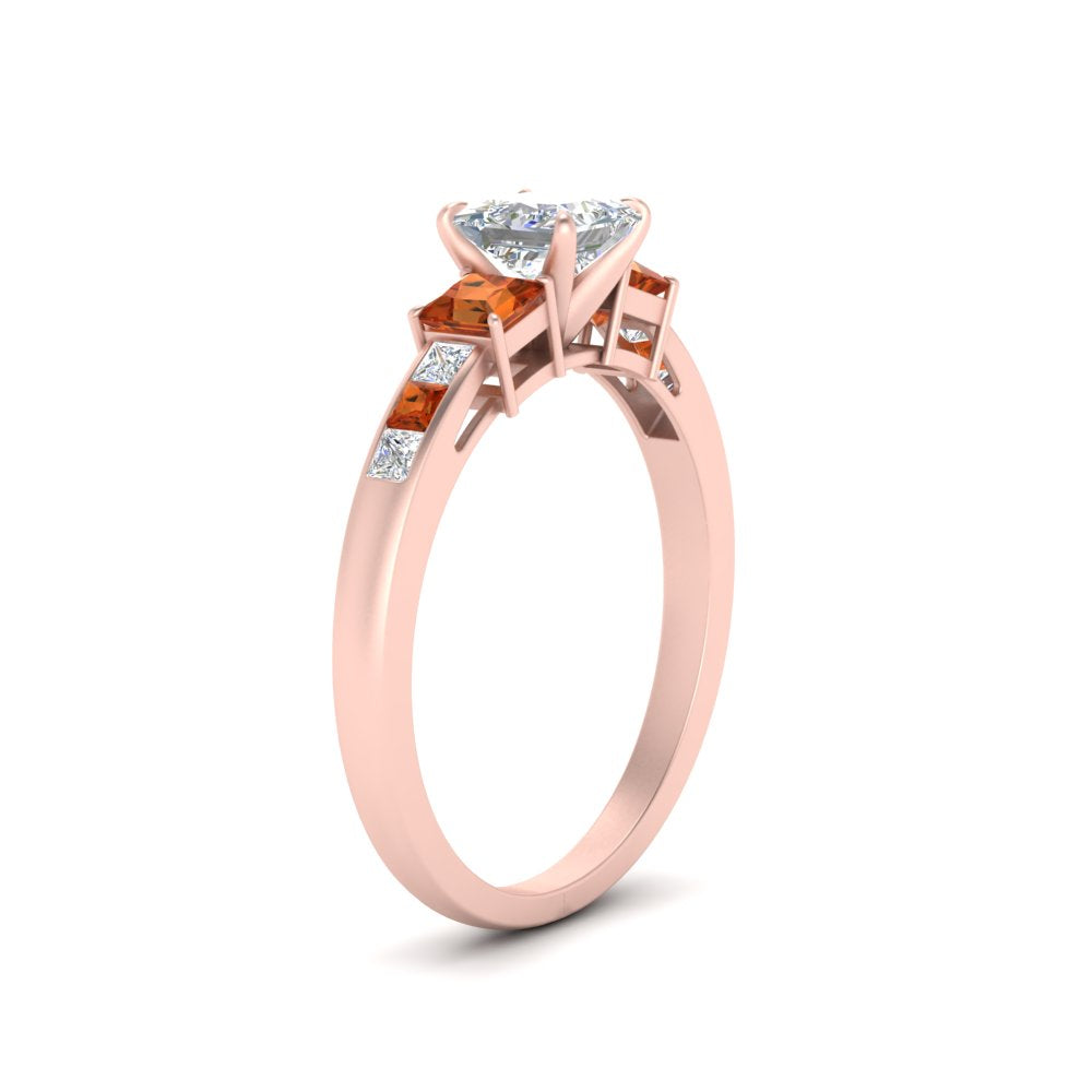 princess-cut-channel-three-stone-diamond-engagement-ring-with-orange-sapphire-in-rose-gold-FDENS205PRRGSAOR-NL-RG.jpg