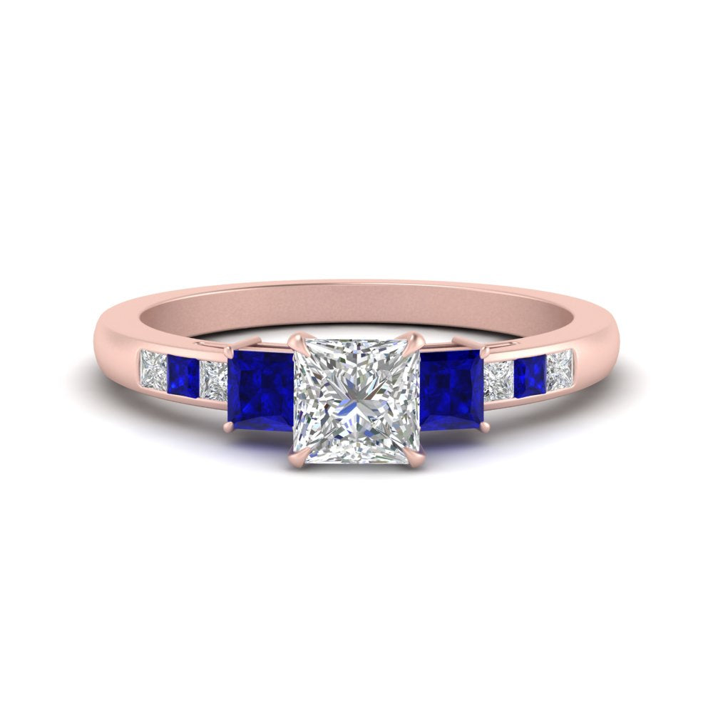 princess-cut-channel-three-stone-diamond-engagement-ring-with-sapphire-in-rose-gold-FDENS205PRRGSABL-NL-RG.jpg