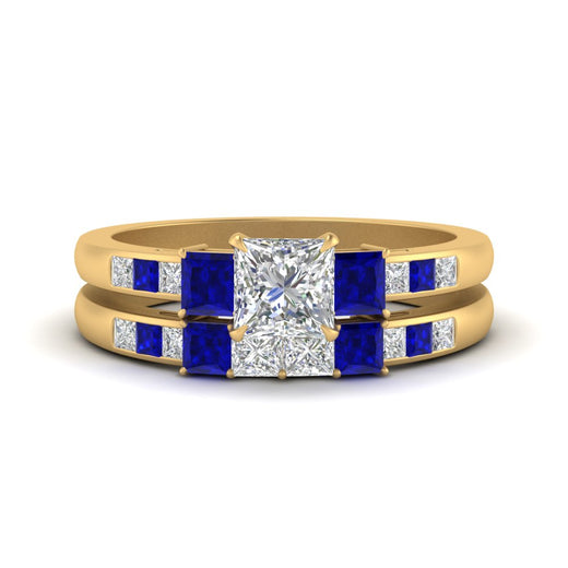 princess-cut-channel-three-stone-diamond-engagement-ring-with-sapphire-in-yellow-gold-FDENS205PRGSABL-NL-YG.jpg