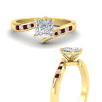 Load image into Gallery viewer, princess-cut-diamond-swirl-channel-set-ruby-wedding-ring-in-yellow-gold-FDENS4028PRRGRUDRANGLE3-NL-YG.jpg?v=1754995974
