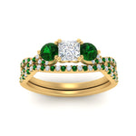 Load image into Gallery viewer, princess-cut-twisted-floral-prong-emerald-wedding-set-in-yellow-gold-FD10257PRGEMGR-ANGLE5-NL-YG?v=1756360051
