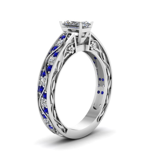 radiant-cut-antique-filigree-diamond-ring-with-blue-sapphire-in-950-platinum-FDENS3543RARGSABLANGLE2-NL-WG_2354ee0b-51e8-4a5f-99b5-42900c5b8e6a
