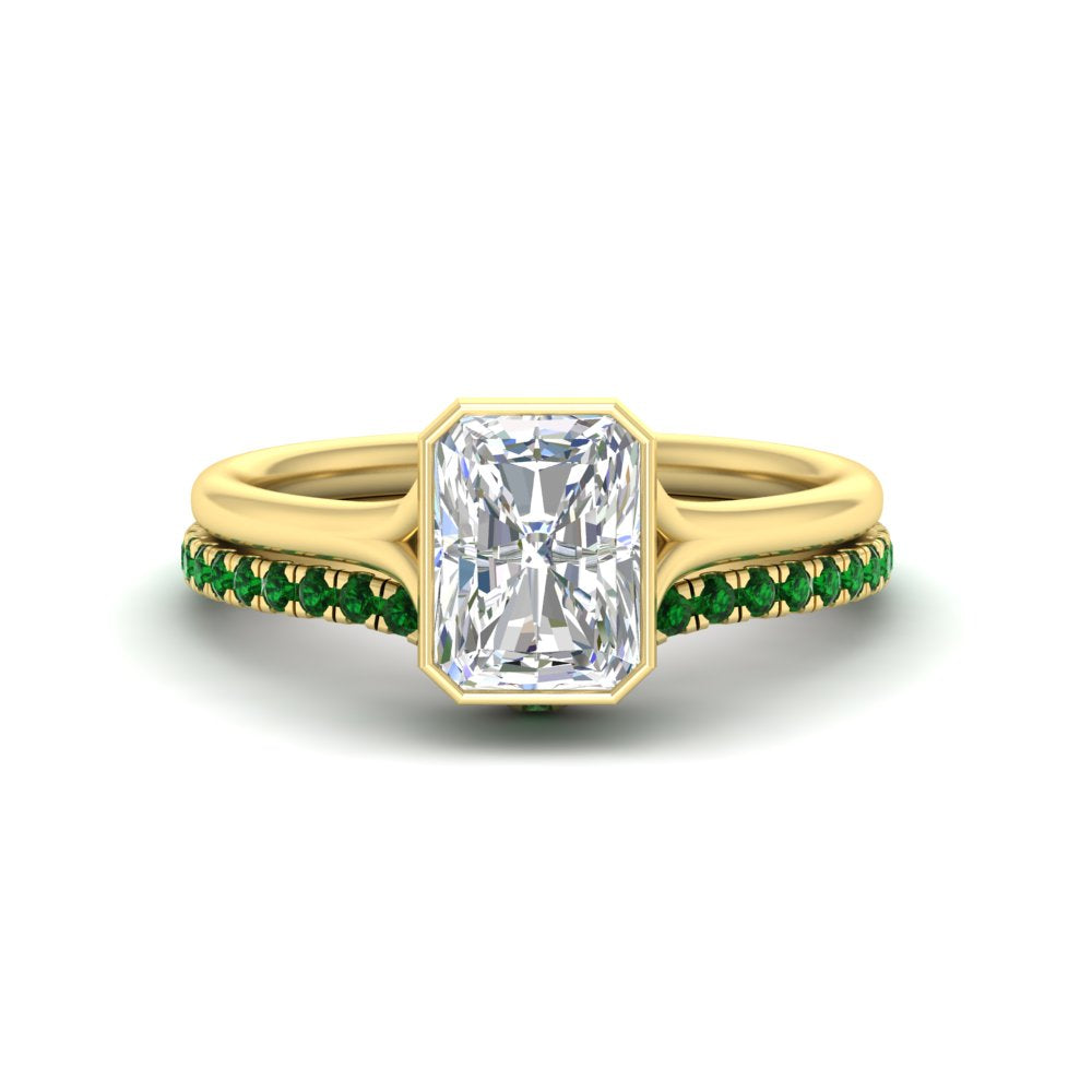 radiant-cut-bezel-solitaire-ring-with-emerald-band-in-yellow-gold-FD11229RAGEMGR-NL-YG_1a35c20a-40f9-4817-abaf-3d2824072205.jpg?v=1758702954