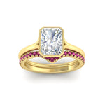 Load image into Gallery viewer, radiant-cut-bezel-solitaire-ring-with-pink-sapphire-band-in-yellow-gold-FD11229RAGSADRPIANGLE5-NL-YG_2a39d0d2-e4a0-439f-9231-e80ee723a91a.jpg?v=1758702954