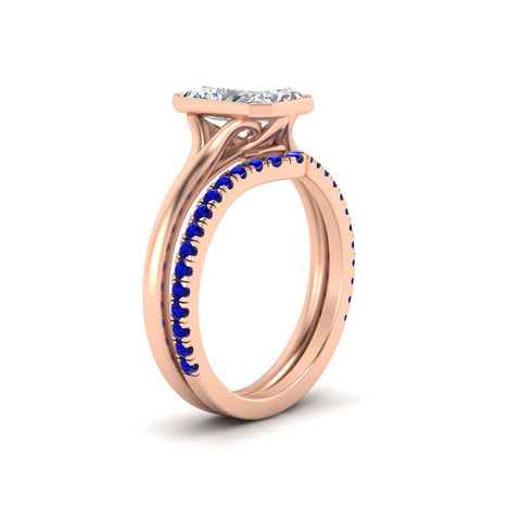 radiant-cut-bezel-solitaire-ring-with-sapphire-band-in-rose-gold-FD11229RAGSABLANGLE2-NL-RG_74f7651d-bc67-4aaa-a81a-7c1978b14c16.jpg?v=1758702953