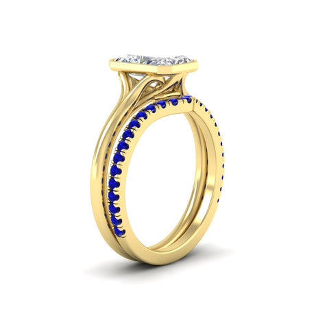 radiant-cut-bezel-solitaire-ring-with-sapphire-band-in-yellow-gold-FD11229RAGSABLANGLE2-NL-YG_75c7d95a-93b2-48d7-971a-ecab052aef7f.jpg?v=1758702954