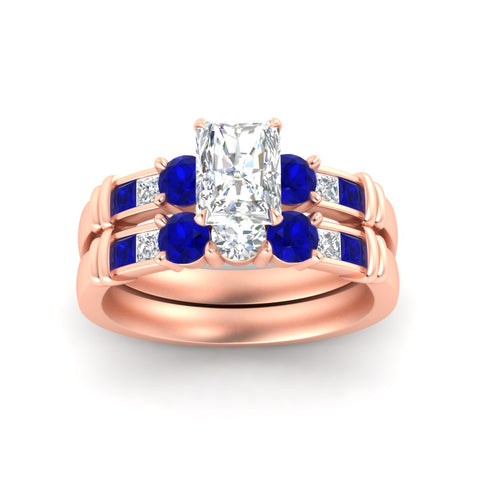 radiant-cut-bridal-ring-set-with-sapphire-princess-channel-accents-in-rose-gold-fdens286ragsablangle5-nl-rg.jpg