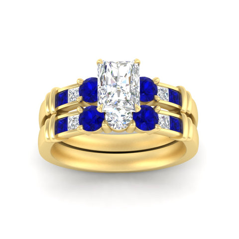 radiant-cut-bridal-ring-set-with-sapphire-princess-channel-accents-in-yellow-gold-fdens286ragsablangle5-nl-yg.jpg