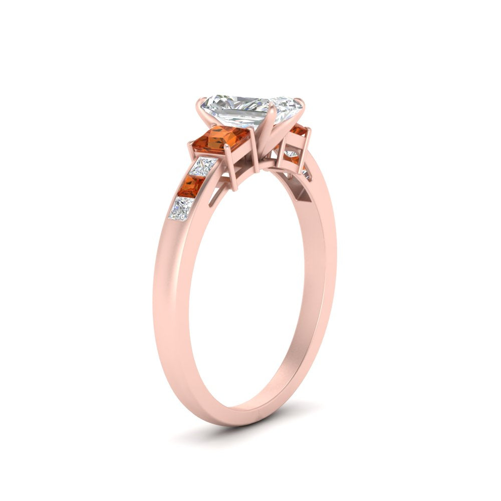 radiant-cut-channel-three-stone-diamond-engagement-ring-with-orange-sapphire-in-rose-gold-FDENS205RARGSAOR-NL-RG.jpg