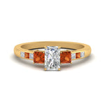 Load image into Gallery viewer, radiant-cut-channel-three-stone-diamond-engagement-ring-with-orange-sapphire-in-yellow-gold-FDENS205RARGSAOR-NL-YG.jpg

