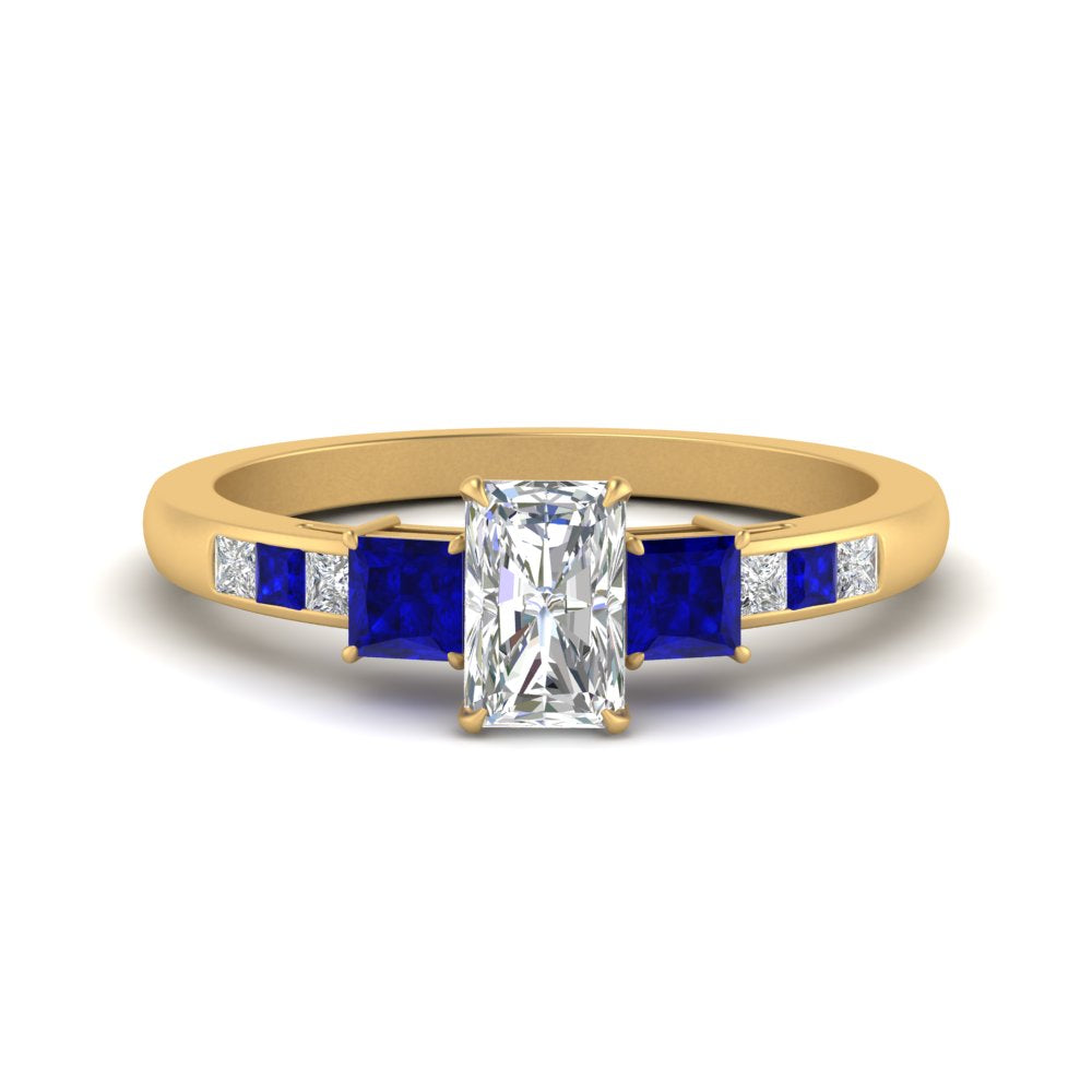 radiant-cut-channel-three-stone-diamond-engagement-ring-with-sapphire-in-yellow-gold-FDENS205RARGSABL-NL-YG.jpg
