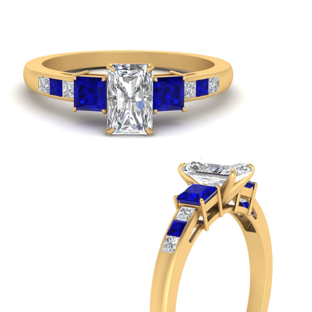 radiant-cut-channel-three-stone-diamond-engagement-ring-with-sapphire-in-yellow-gold-FDENS205RARGSABL-NL-YG.jpg