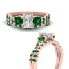 Load image into Gallery viewer, radiant-cut-twisted-floral-prong-emerald-wedding-set-in-rose-gold-FD10257RAGEMGR-ANGLE3-NL-RG_21ffec6e-446c-48f3-ba25-5f3c01ed9b6e?v=1756360178