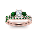 Load image into Gallery viewer, radiant-cut-twisted-floral-prong-emerald-wedding-set-in-rose-gold-FD10257RAGEMGR-ANGLE5-NL-RG_e1af278b-e2b7-4e11-b3f1-256377343266?v=1756360178
