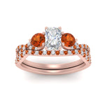 Load image into Gallery viewer, radiant-cut-twisted-floral-prong-orange-sapphire-wedding-set-in-rose-gold-FD10257RAGSAOR-ANGLE5-NL-RG_f6daba9e-d9ce-4aec-8ff0-dfec26a421f4?v=1756360178
