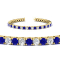 Thumbnail 67 - real-diamond-tennis-bracelet-with-sapphire-9-carat-in-yellow-gold-FDBRC8635ROGSABLANGLE2-9.00_20CT-NL-YG