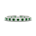 Load image into Gallery viewer, round-channel-set-eternity-band-with-emerald-in-white-gold-fdewb158gemgrsleep-nl-wg
