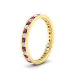 Load image into Gallery viewer, round-channel-set-eternity-band-with-pink-sapphire-in-yellow-gold-fdewb158gsadrpiangle2-nl-yg
