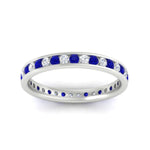 Load image into Gallery viewer, round-channel-set-eternity-band-with-sapphire-in-white-gold-fdewb158gsablangle5-nl-wg
