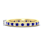Load image into Gallery viewer, round-channel-set-eternity-band-with-sapphire-in-yellow-gold-fdewb158gsablsleep-nl-yg-hw
