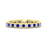 Load image into Gallery viewer, round-channel-set-eternity-band-with-sapphire-in-yellow-gold-fdewb158gsablsleep-nl-yg
