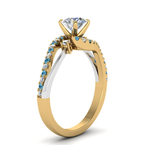 round-cut-2-tone-3-stone-diamond-swirl-engagement-ring-with-ice-blue-topaz-in-14K-yellow-gold-FDO50895RORGICBLTOANGLE2-NL-YG?v=1774335328