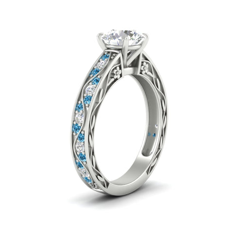 round-cut-antique-filigree-blue-topaz-engagement-ring-in-white-gold-fdens3543rorgicbltoangle2-nl-wg.jpg