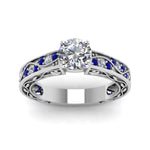 Load image into Gallery viewer, round-cut-antique-filigree-diamond-ring-with-blue-sapphire-in-950-platinum-FDENS3543RORGSABLANGLE5-NL-WG_a6517e08-24b6-4e11-b8d3-5f76d546423c
