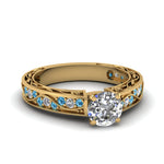 Load image into Gallery viewer, round-cut-antique-filigree-diamond-ring-with-ice-blue-topaz-in-14K-yellow-gold-FDENS3543RORGICBLTO-NL-YG_e2326732-c414-4bd9-8759-9e5ebdaf4ecd
