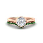Load image into Gallery viewer, round-cut-bezel-solitaire-ring-with-emerald-band-in-rose-gold-FD11229ROGEMGR-NL-RG_aeaa261c-d72f-48e9-859c-65b48c77c251.jpg?v=1758702963
