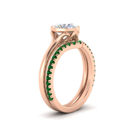 round-cut-bezel-solitaire-ring-with-emerald-band-in-rose-gold-FD11229ROGEMGRANGLE2-NL-RG_97da8d76-de1a-44bd-b600-fe08ca28bf22.jpg?v=1758702963