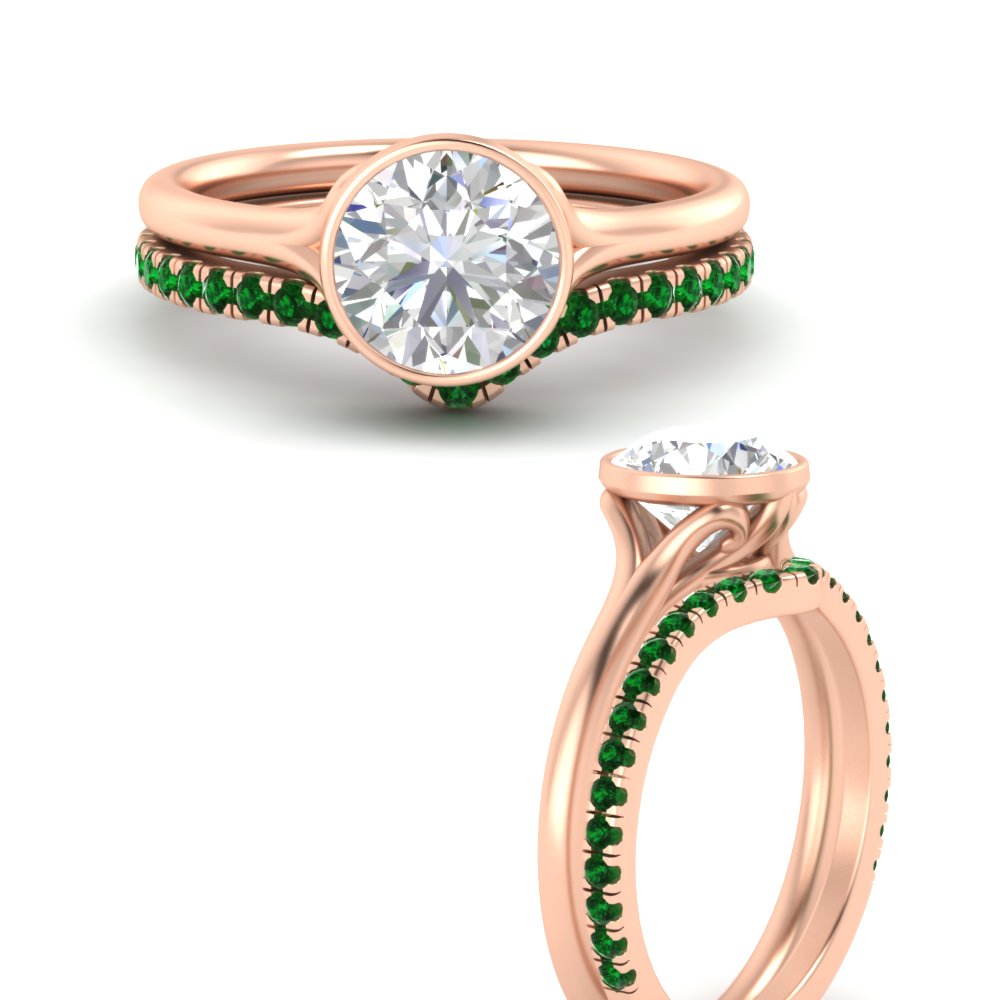 round-cut-bezel-solitaire-ring-with-emerald-band-in-rose-gold-FD11229ROGEMGRANGLE3-NL-RG.jpg?v=1758702902