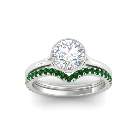 round-cut-bezel-solitaire-ring-with-emerald-band-in-white-gold-FD11229ROGEMGRANGLE5-NL-WG_074d5767-be68-4908-b443-13234954e592.jpg?v=1758702963