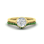 Load image into Gallery viewer, round-cut-bezel-solitaire-ring-with-emerald-band-in-yellow-gold-FD11229ROGEMGR-NL-YG.jpg?v=1758702902