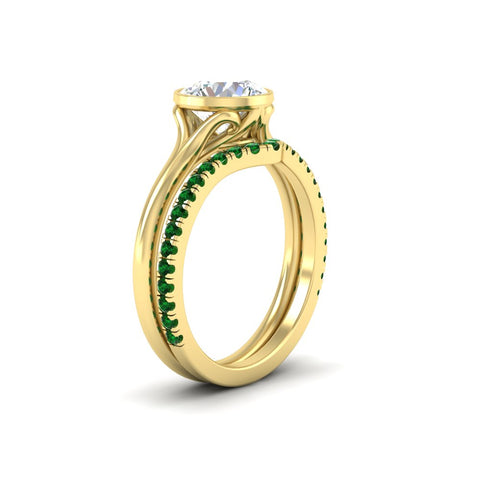 round-cut-bezel-solitaire-ring-with-emerald-band-in-yellow-gold-FD11229ROGEMGRANGLE2-NL-YG_75ecd83f-9476-4b78-9480-7351ed6f3359.jpg?v=1758702963