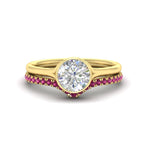 Load image into Gallery viewer, round-cut-bezel-solitaire-ring-with-pink-sapphire-band-in-yellow-gold-FD11229ROGSADRPI-NL-YG.jpg?v=1758702902