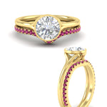 Load image into Gallery viewer, round-cut-bezel-solitaire-ring-with-pink-sapphire-band-in-yellow-gold-FD11229ROGSADRPIANGLE3-NL-YG.jpg?v=1758702903
