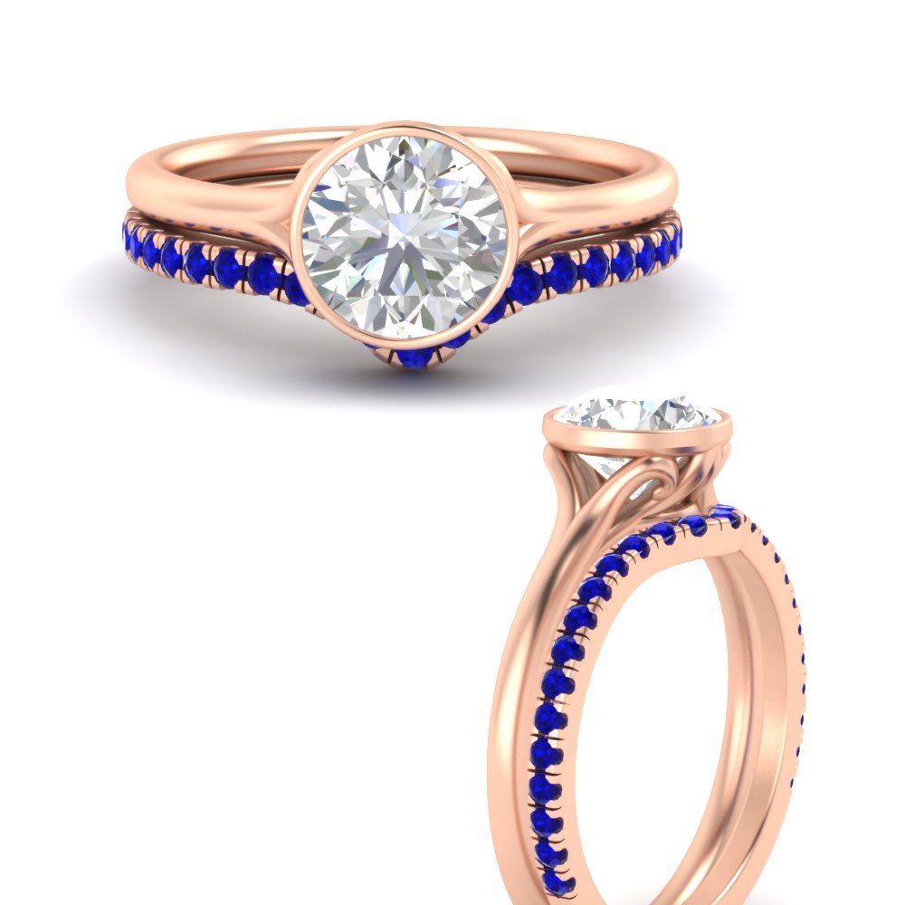 round-cut-bezel-solitaire-ring-with-sapphire-band-in-rose-gold-FD11229ROGSABLANGLE3-NL-RG.jpg?v=1758702902