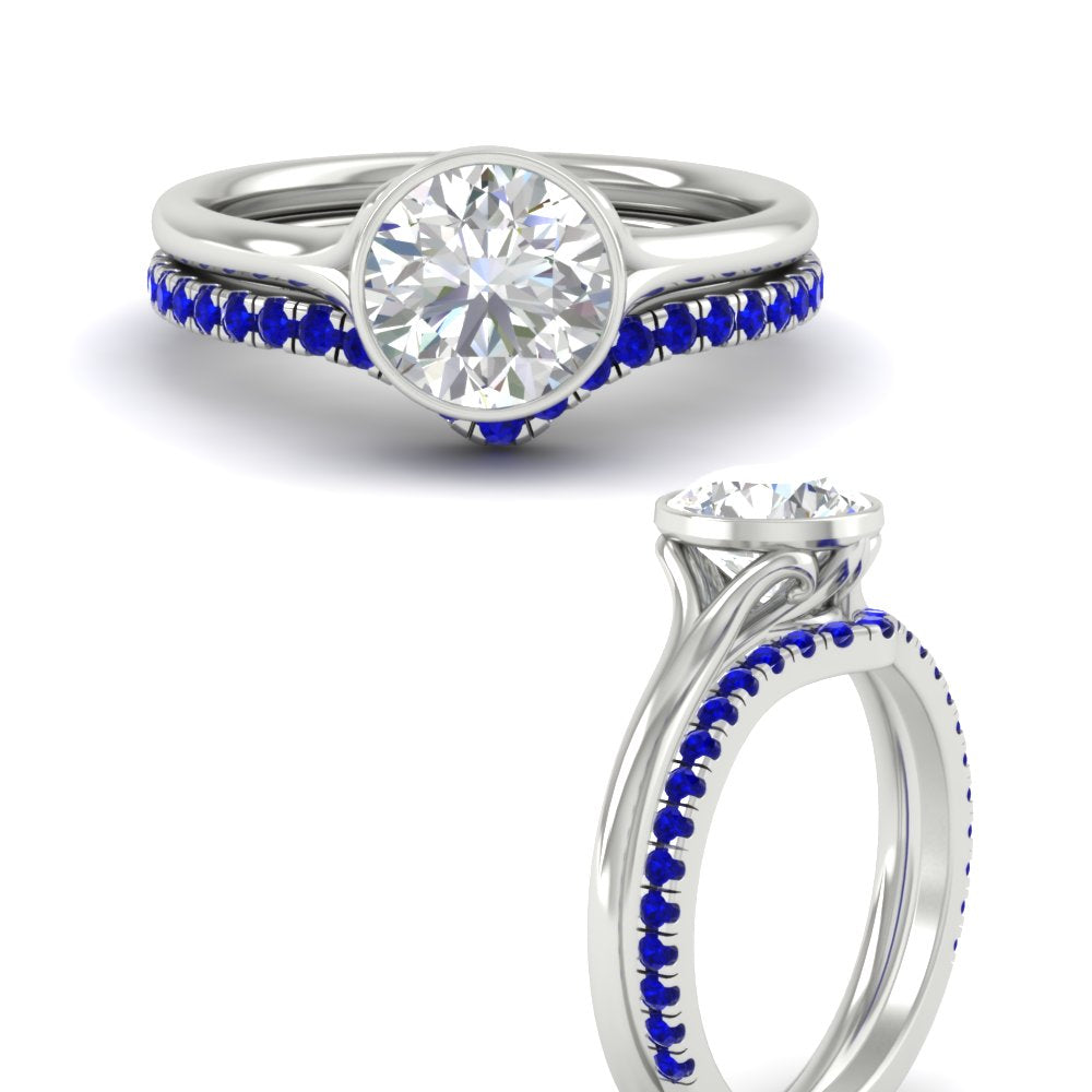 round-cut-bezel-solitaire-ring-with-sapphire-band-in-white-gold-FD11229ROGSABLANGLE3-NL-WG.jpg?v=1758702902