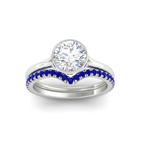 round-cut-bezel-solitaire-ring-with-sapphire-band-in-white-gold-FD11229ROGSABLANGLE5-NL-WG.jpg?v=1758702901
