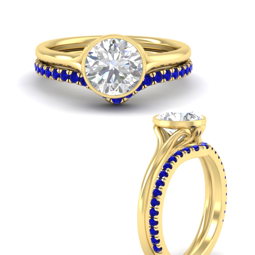 round-cut-bezel-solitaire-ring-with-sapphire-band-in-yellow-gold-FD11229ROGSABLANGLE3-NL-YG.jpg?v=1758702902