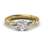 Load image into Gallery viewer, round-cut-blue-topaz-twisted-vine-engagement-ring-in-yellow-gold-FD9127RORGICBLTO-NL-YG