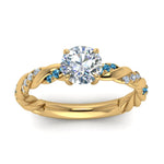 Load image into Gallery viewer, round-cut-blue-topaz-twisted-vine-engagement-ring-in-yellow-gold-FD9127RORGICBLTOANGLE5-NL-YG
