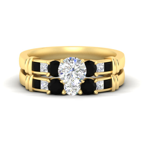 round-cut-bridal-ring-set-with-black-diamond-princess-channel-accents-in-yellow-gold-fdens286rogblacksleep-nl-yg.jpg
