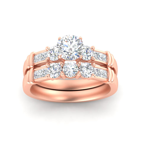 round-cut-bridal-ring-set-with-princess-channel-accents-in-rose-gold-fdens286roangle5-nl-rg.jpg