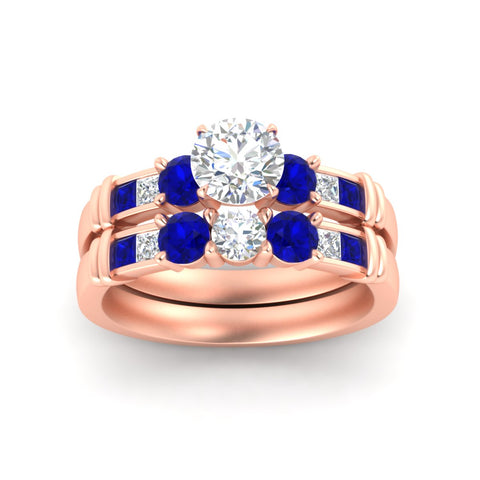 round-cut-bridal-ring-set-with-sapphire-princess-channel-accents-in-rose-gold-fdens286rogsablangle5-nl-rg.jpg