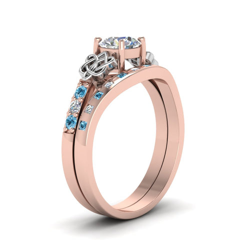 round-cut-celtic-diamond-ring-and-matching-band-with-blue-topaz-in-14K-rose-gold-FDENS2255B4ROGICBLTOANGLE2-NL-RG?v=1757052247