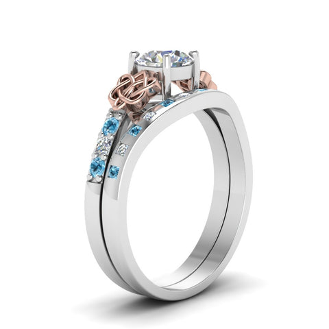 round-cut-celtic-diamond-ring-and-matching-band-with-blue-topaz-in-14K-white-gold-FDENS2255B4ROGICBLTOANGLE2-NL-WG?v=1757052247