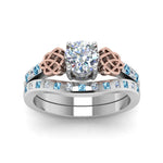 Load image into Gallery viewer, round-cut-celtic-diamond-ring-and-matching-band-with-blue-topaz-in-950-Platinum-FDENS2255B4ROGICBLTOANGLE5-NL-WG_98e05cd8-7bf0-4044-a369-c7be72610c93?v=1757052331
