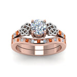 Load image into Gallery viewer, round-cut-celtic-diamond-ring-and-matching-band-with-orange-sapphire-in-14K-rose-gold-FDENS2255B4ROGSAORANGLE5-NL-RG_ddcbb98b-58be-4a4b-bdf3-e29fe984fad5?v=1757052331

